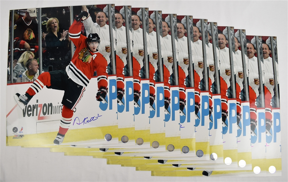 Duncan Keith Lot of 12 Autographed 16x20 Photos