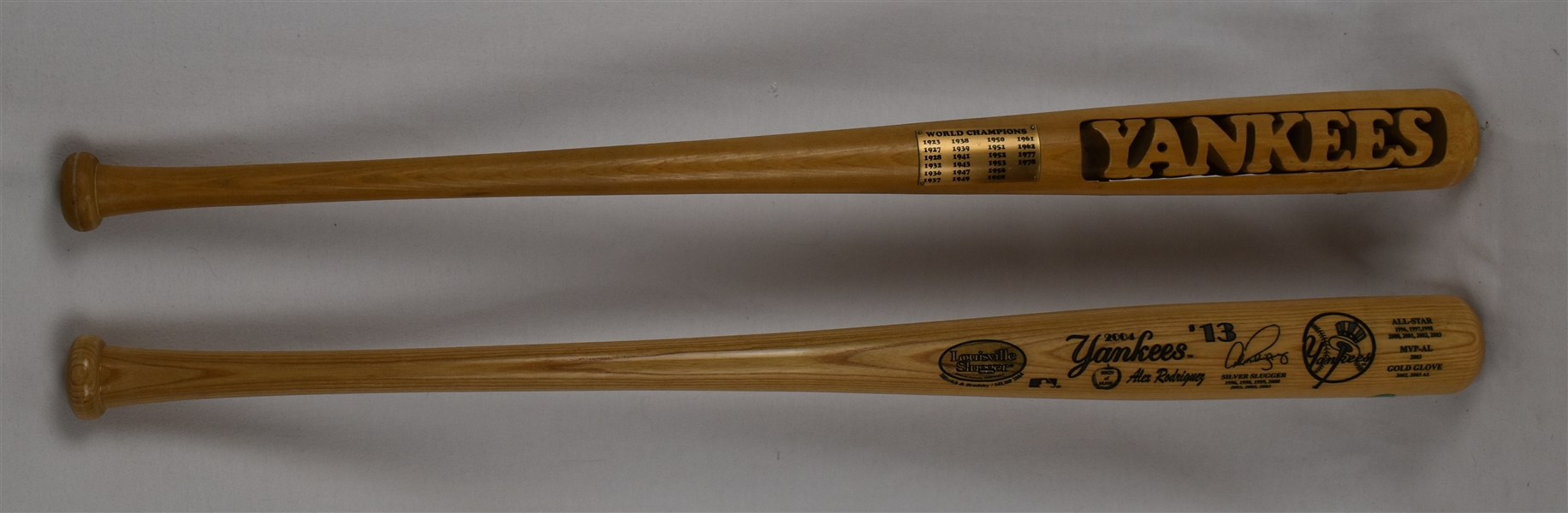 New York Yankee Baseball Bat showing all World Championships 	from 1923-1978 & Alex Rodriguez Engraved Bat