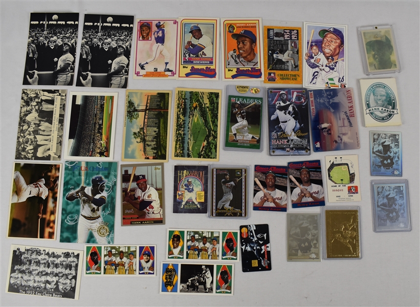 Hank Aaron Collection of 33 Miscellaneous Sized Baseball Cards