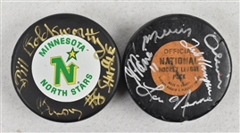 Bill Goldsworthy & JP Parise Autographed Hockey Pucks
