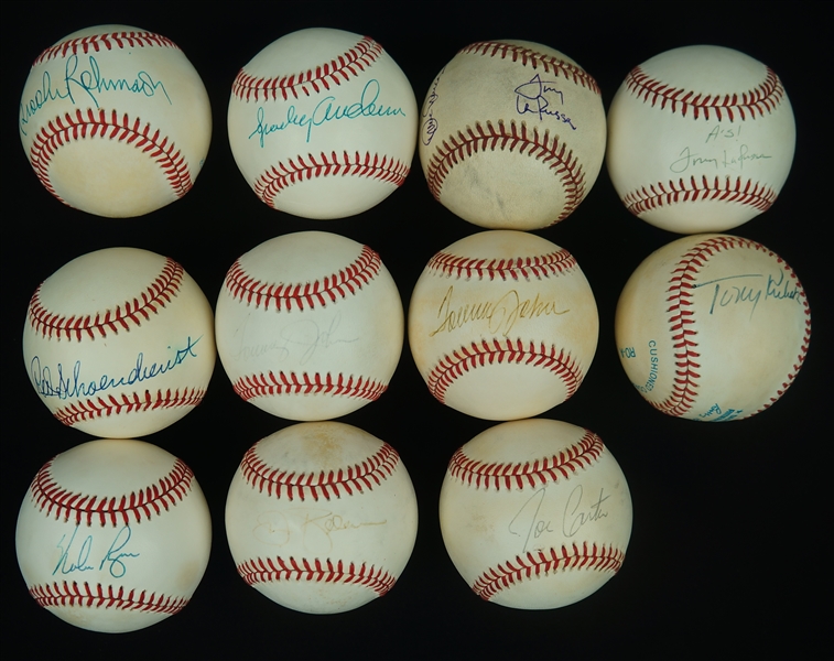 Lot of 11 Autographed Baseballs w/Nolan Ryan  