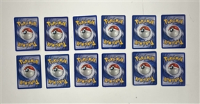 Collection of Over 300 Pokemon Cards w/ 7 Rare Cards