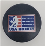 Herb Brooks, Jim Craig, & Mike Eruzione Autographed USA Hockey Puck w/ Beckett LOA