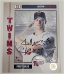 Justin Morneau Collection w/ 4 Bobbleheads & 2 Autographed 8x10 Photos