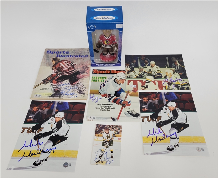 Autographed Hockey Lot w/ Brian Bellows, Tony Esposito, Mike Modano, Mike Bossy, & Bobby Hull Beckett