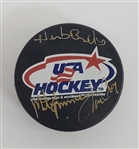 Herb Brooks, Mike Eruzione, & Jim Craig Autographed USA Hockey 1980 Puck w/ Beckett LOA