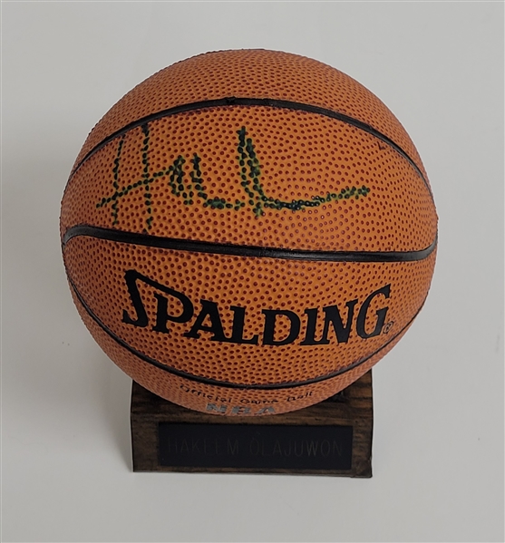 Hakeem Olajuwon Autographed Mini Spalding Basketball Beckett
