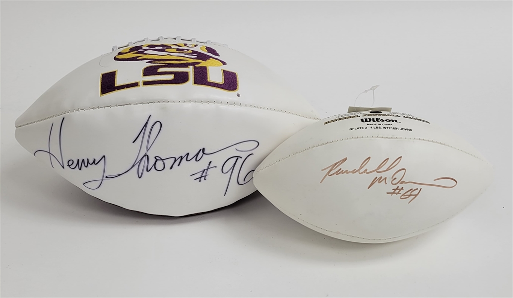 Lot of 2 Randall McDaniel & Henry Thomas Autographed Footballs Beckett