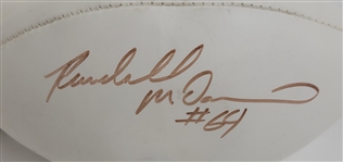 Lot of 2 Randall McDaniel & Henry Thomas Autographed Footballs Beckett